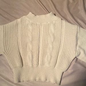 Cozy cream sweater with wide sleeves